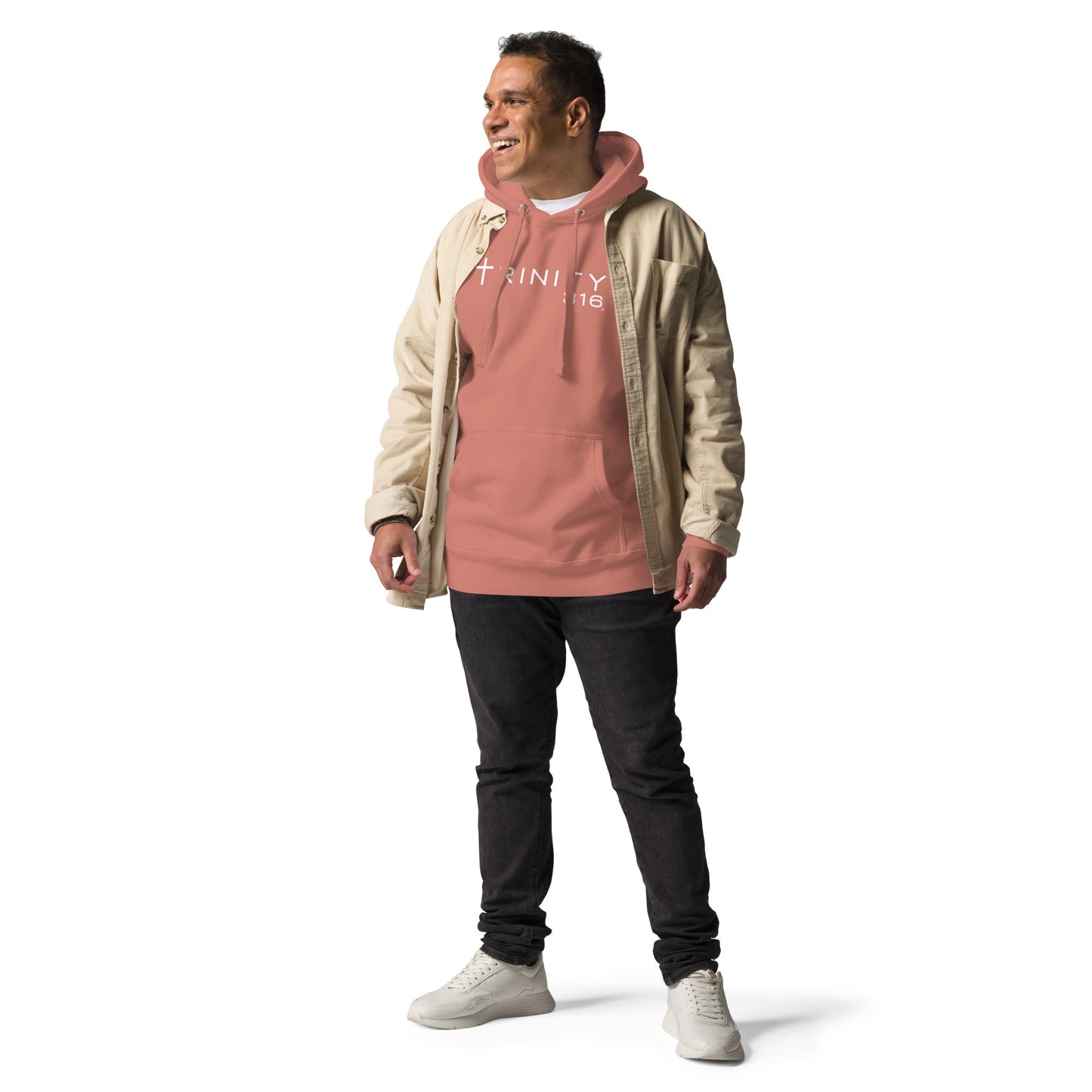 A man wearing a pink hoodie and jeans, showcasing a unisex premium hoodie in dusty rose color from the front.