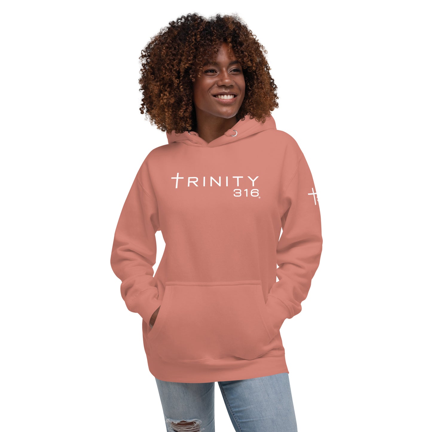 Unisex premium hoodie in dusty rose featuring a prominent cross design on the front.