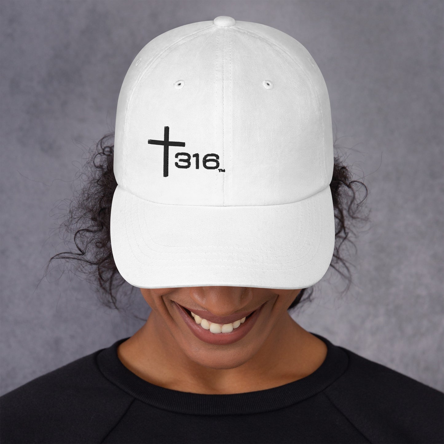 A cheerful woman dons a white classic dad hat with "Asia" written on the front, radiating positivity and style.