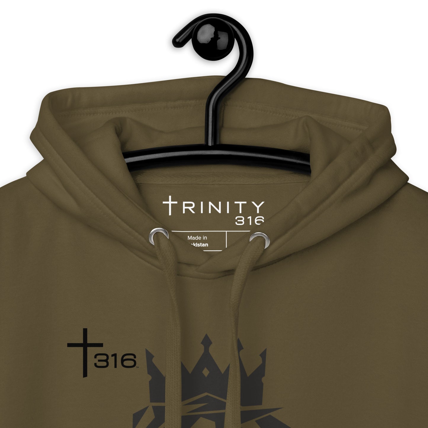 A close-up of a military green unisex premium hoodie featuring the word trinity 316 prominently displayed