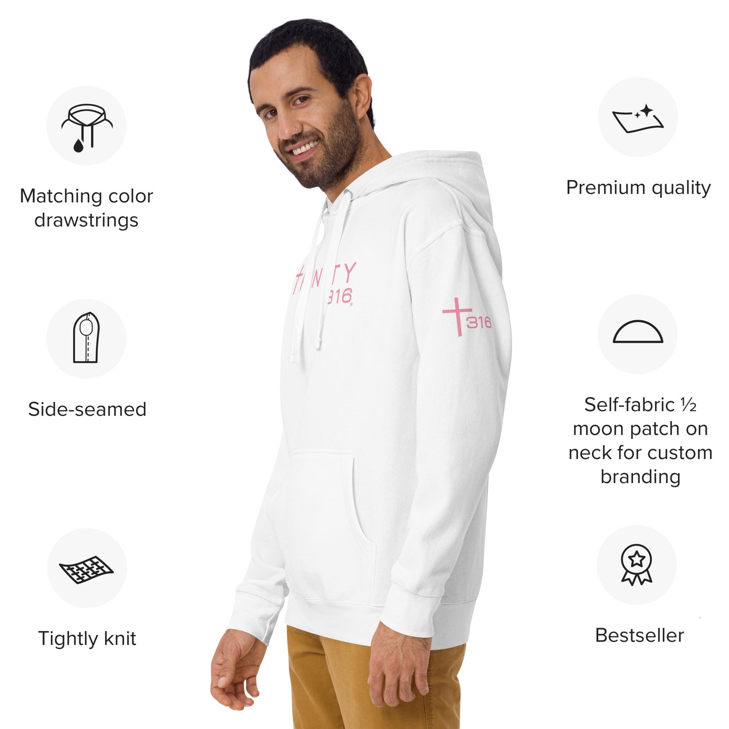 A man wearing a white hoodie that reads "love is life," showcasing a casual and positive attitude.