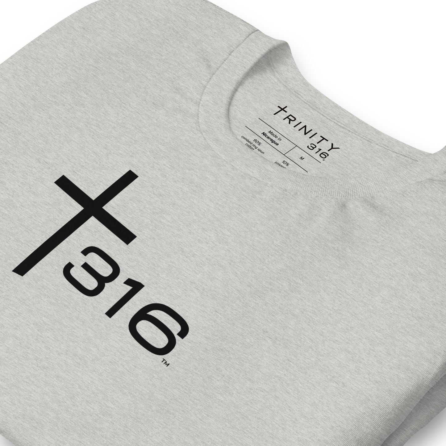 A close-up of a grey sweatshirt featuring the word trinity 316 prominently displayed, ideal for a unisex staple t-shirt.