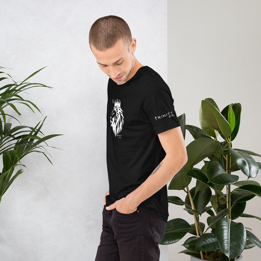 A man dressed in a black t-shirt adorned with a white skull graphic, embodying a bold fashion statement.