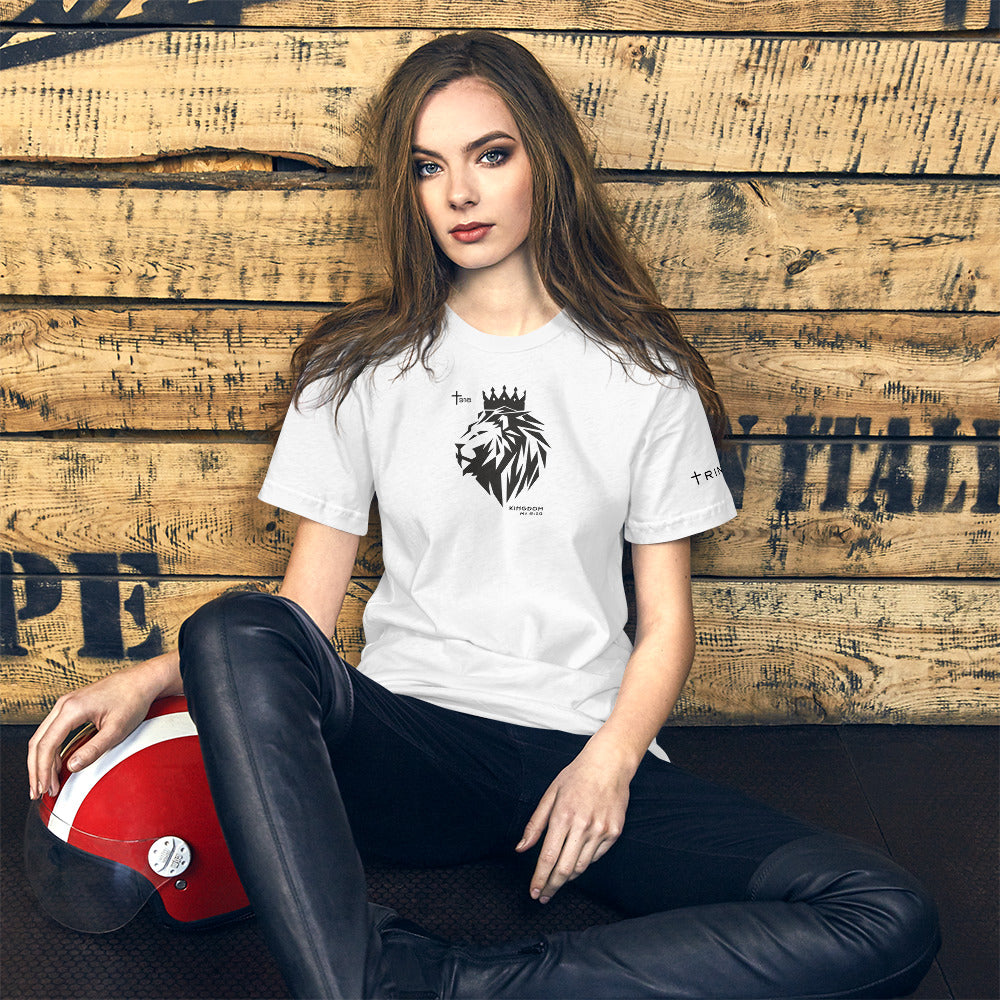 A woman dressed in a white t-shirt and black pants is seated on a wooden bench, exuding a casual and comfortable vibe.