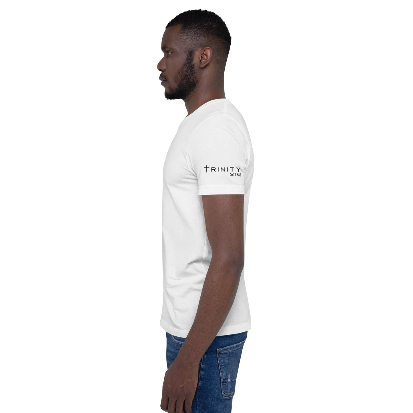 A man wearing a white t-shirt that reads "the future is now," showcasing a modern and optimistic message.