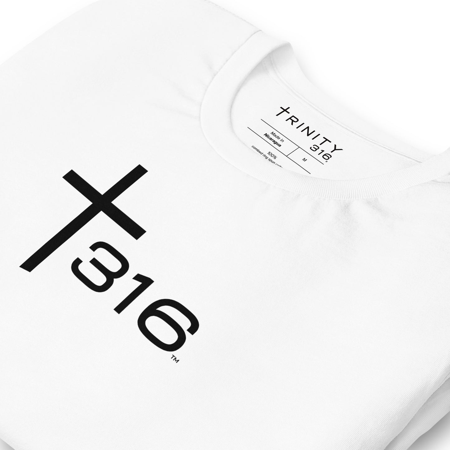 Detailed image of a white t-shirt adorned with the number '16', highlighting its classic style.