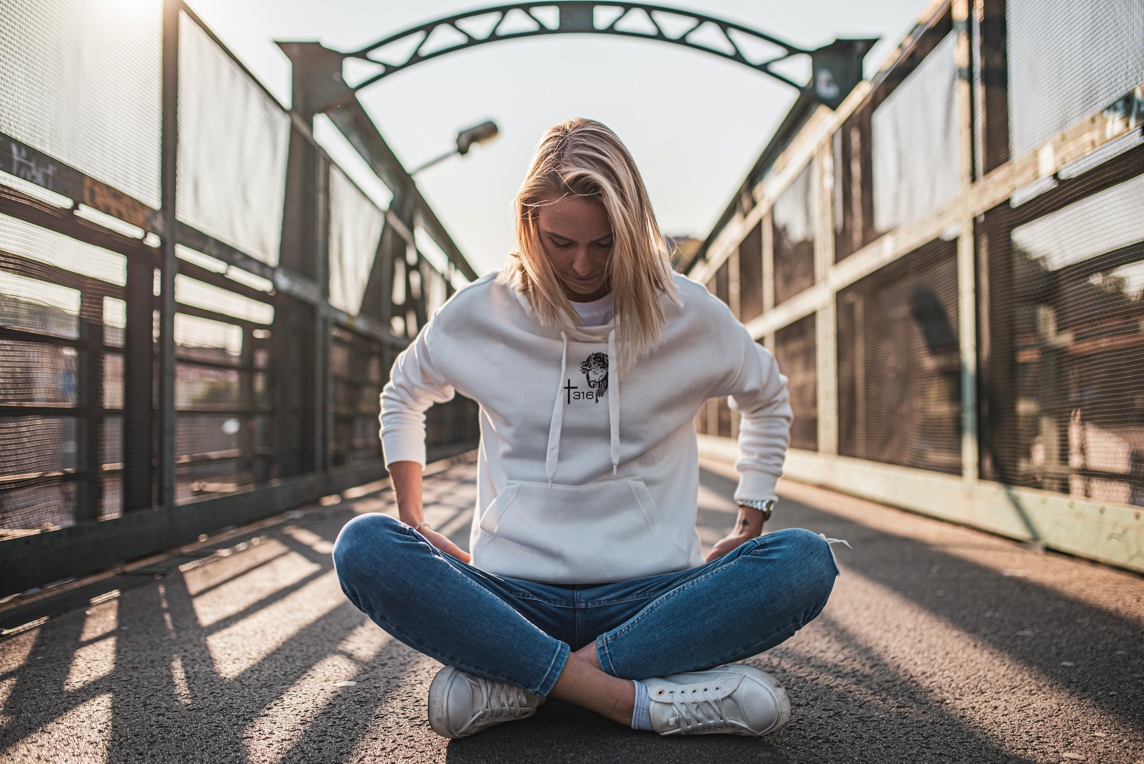woman wearing t316 white sweatshirt