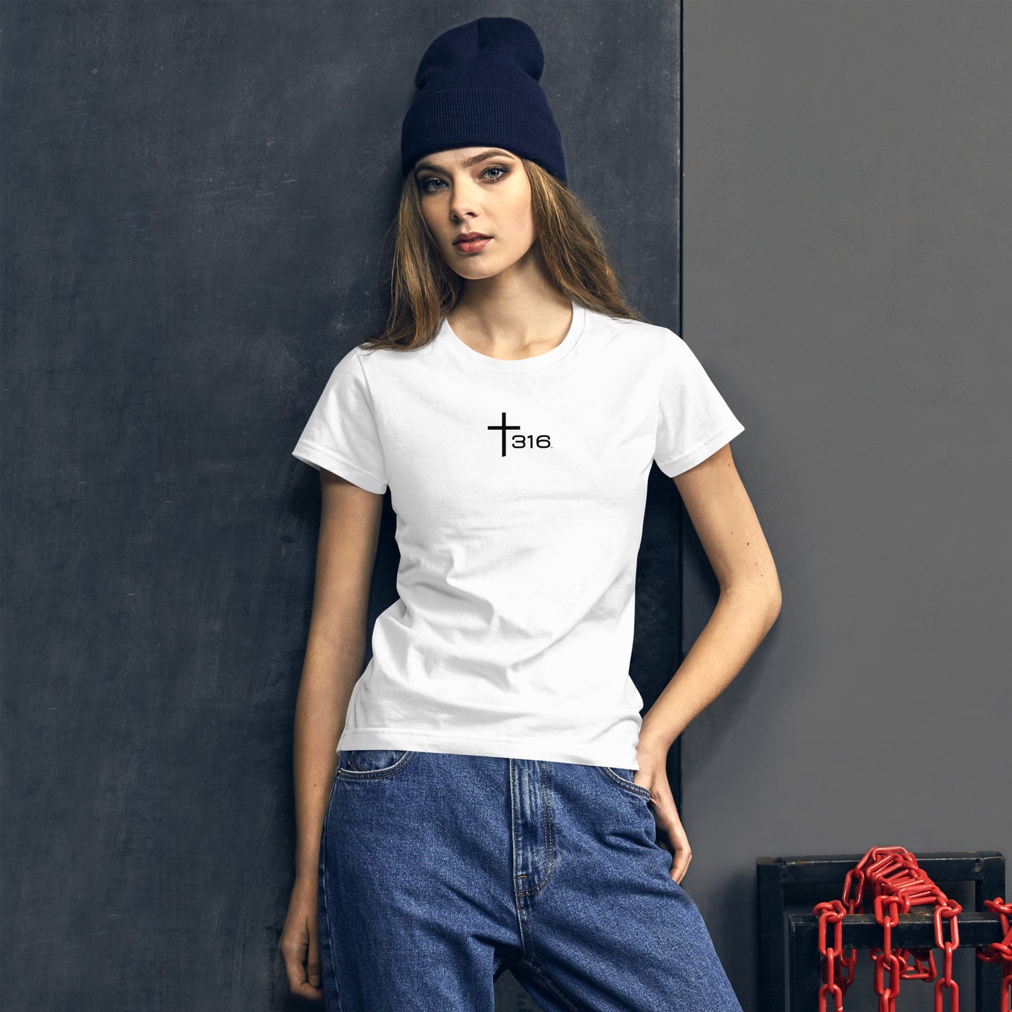 A woman models a white t-shirt with "love" printed on it, representing a trendy choice in women's fashion.